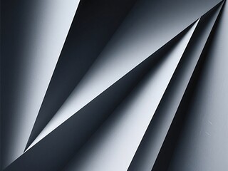 Abstract composition of angled paper layers in tonal gradations of gray and white