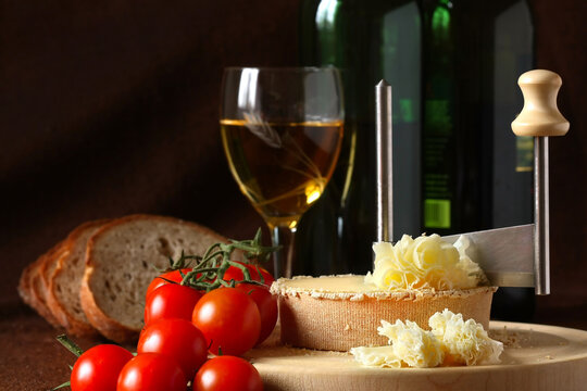 Retro Still Life - Swiss Cheese Specialty - Tete De Moine on the scraper Girolle, DOF on cheese