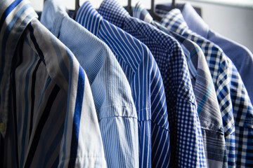 Shirts on Hangers A Stylish Collection of Blue Attire