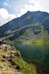 Picturesque landscape with the Balea cottage in the Fagaras mountains (Transfagarasan) - Romania.