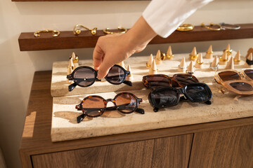 Display of elegant sunglasses in stylish retail shop