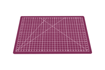 Pink cutting mat with white grid and diagonal angles is isolated. Perspective view from above.