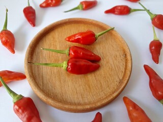 Red chili fruit. Chili are spicy fruits of plant from the genus Capsicum, known for their heat and...