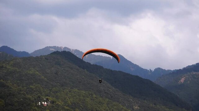 Paragliding at Bir Billing Himachal Pradesh India 2. 30 pm 10 January 2025 filmed from underneath. 4k high resolution footage.