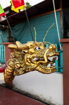 Closeup of golden dragon boat head, Chew Jetty, Malaysia