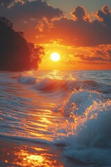 Dramatic sunrise over the ocean, waves crashing on the shore.  Sunrise colors reflected in the water