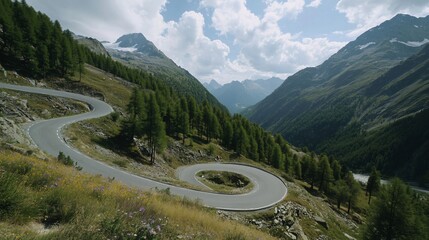 Serpentine Mountain Road Winding Through Alpine Landscape