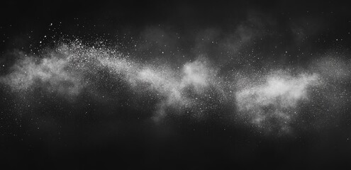A swirling cloud of white dust against a dark background (1)
