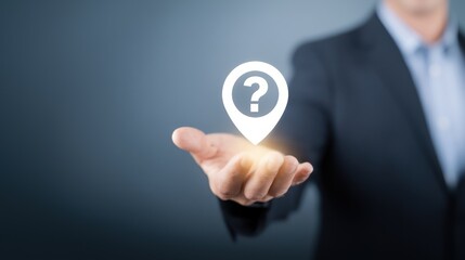 Businessman holds a glowing location icon with a question mark, showing location search, travel help, and online ride service in on demand ride services
