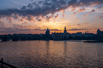 Naklejka premium Prague, Czech Republic - 05.01.2025 - the old town city center of prague, charles bridge during sunrise