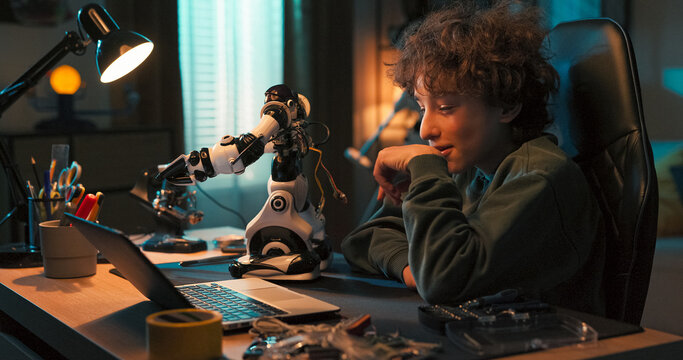 Driven by interest in robotics, the child works with cables and a robot. He looks for guidance on the internet and builds practical skills through experimentation.