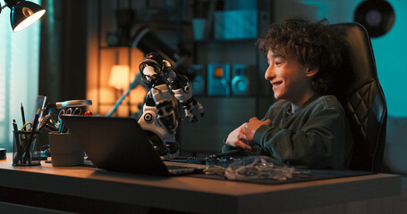 Concentrated on the glowing machine, the child wonders how to reconnect wires. He studies the toy and imagines how to bring the electronics back to life.