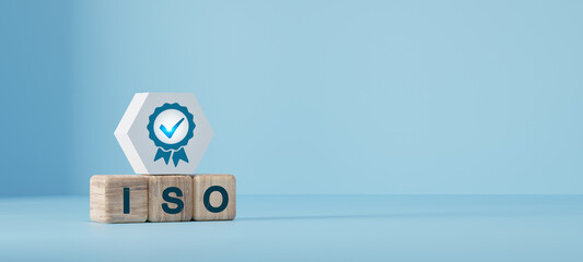 ISO quality control certification concept. wooden cubes with the abbreviation ISO with a check mark.