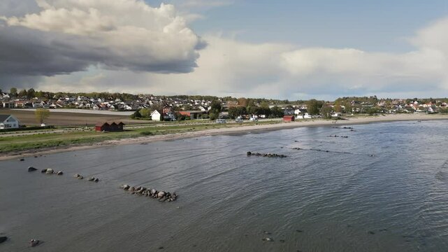 Aerial drone shot over Ringshaugstranda a beach located near T&oslash;nsberg in Norway.