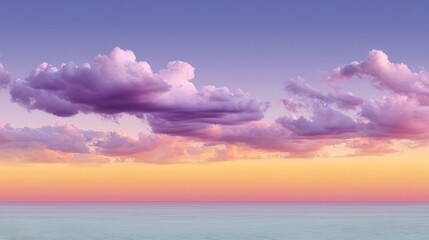 Obraz premium Peaceful Pastel Sunset Over Calm Ocean with Pink and Purple Clouds