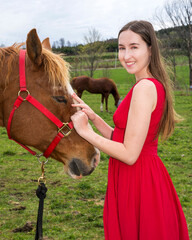 A beautiful woman and her horse