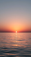 Obraz premium Serene Sunset over Calm Ocean Waters Peaceful Pink and Orange Horizon