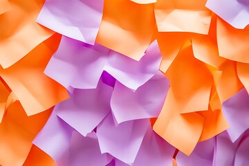 Overhead view of colorful sticky notes scattered across a surface, creating a vibrant abstract pattern