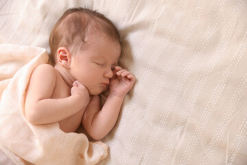 Bedtime. Cute little baby sleeping in bed indoors, top view. Space for text