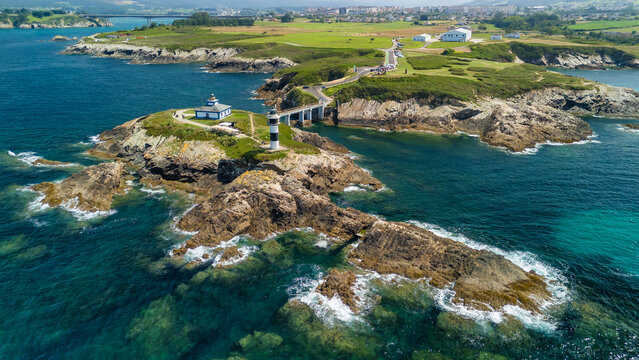 Fototapeta Aerial view of Faro de Ribadeo lighthouse in Lugo, Galicia, Spain.