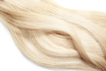 Naklejka premium Locks of healthy blond hair on white background