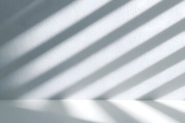 Obraz premium Minimalist interior with striking shadow patterns creates a serene and bright ambiance.