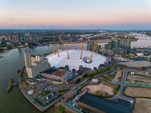 Aerial view of the O2 Millenium Dome and Peninsula of Greenwich in London during sunset