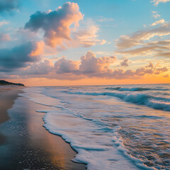 Vibrant sunset reflecting on calm sea and quiet beach high resolution picture