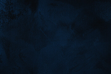 Elegant navy blue colored dark Concrete textured cool grunge abstract background with roughness and irregularities. 2020 color trend concept.