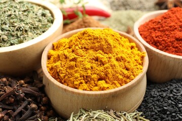 Many different spices on table, closeup view