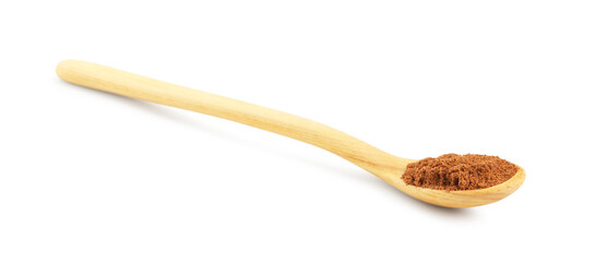 Nutmeg powder in spoon isolated on white