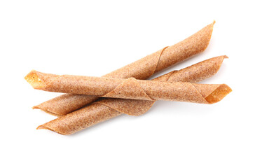 Delicious fruit leather rolls on white background, top view