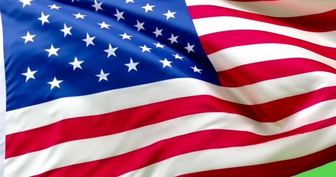 Realistic American flag gently waving in the wind, isolated on a bright green screen background