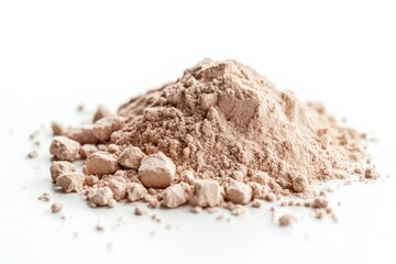 Light beige powder pile, scattered fragments
