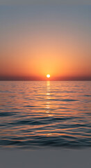 Obraz premium Serene Sunset over Calm Ocean Waters Peaceful Golden Hour Seascape