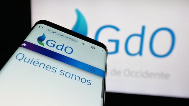 Stuttgart, Germany - 05-05-2025: Mobile phone with logo of energy company Gases de Occidente S.A. on screen in front of website. Focus on top-left of phone display.