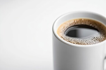Close-up of a steaming mug of black coffee.  Dark, rich liquid, visible crema, and a white mug against a white background