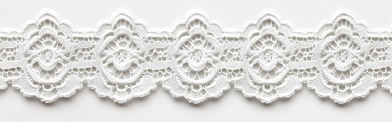 Ornate white lace trim with floral motifs