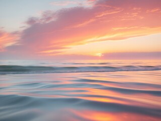 Obraz premium Serene Ocean Sunset with Pastel Skies and Gentle Waves Reflecting the Colors.