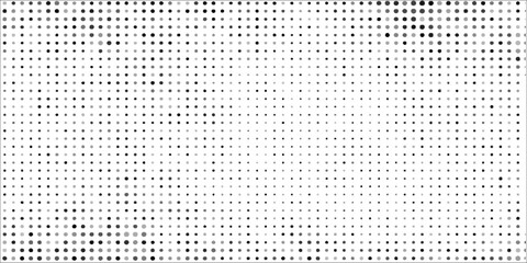 Halftone faded gradient texture. Grunge halftone grit background. White and black sand noise wallpaper.
