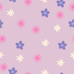 Delicate seamless pattern with multicolored flowers on a light pink background. Violet, cream, and pink blooms create a soft spring atmosphere — perfect for design and decor