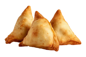 Three fried triangular samosas against a black background.