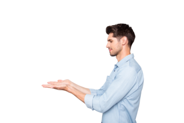 Profile side photo of focused man hold hand present ads promo in his palms real promoter wear casual style isolated over grey color background