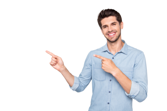 Portrait of positive cheerful man promoter point index finger indicate suggest promo ads wear casual style clothes isolated over grey color background
