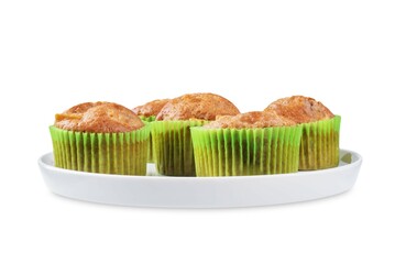 Cinnamon muffins with pear slices on a white isolated background