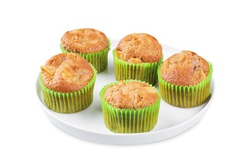 Cinnamon muffins with pear slices on a white isolated background