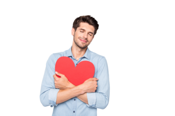 My love... Portrait of charming dreamy man hug embrace red big paper card heart gift for 14-february received from his charming wife wear casual style clothes isolated over grey color background