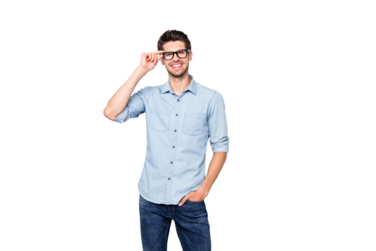 Photo of cheerful positive handsome attractive business man standing confifrntly with hand in jeans pocket smiling toothily isolated over grey color background
