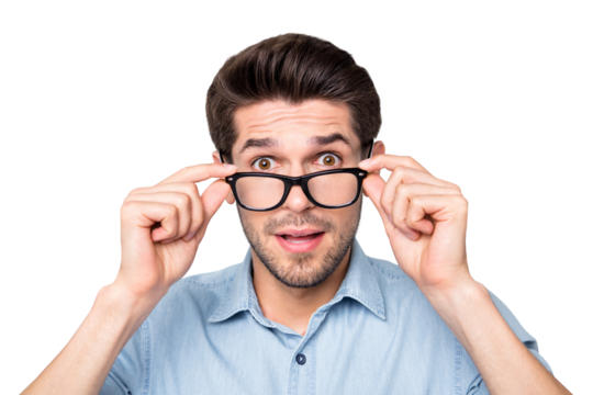 Close up photo of speechless man shocked with his eyesight corrected with new eyewear isolated over grey color background