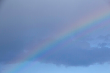 natural background: close up of rainbow in a cloudy sky